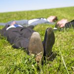 MenLayingInGrass | Catalyst Center