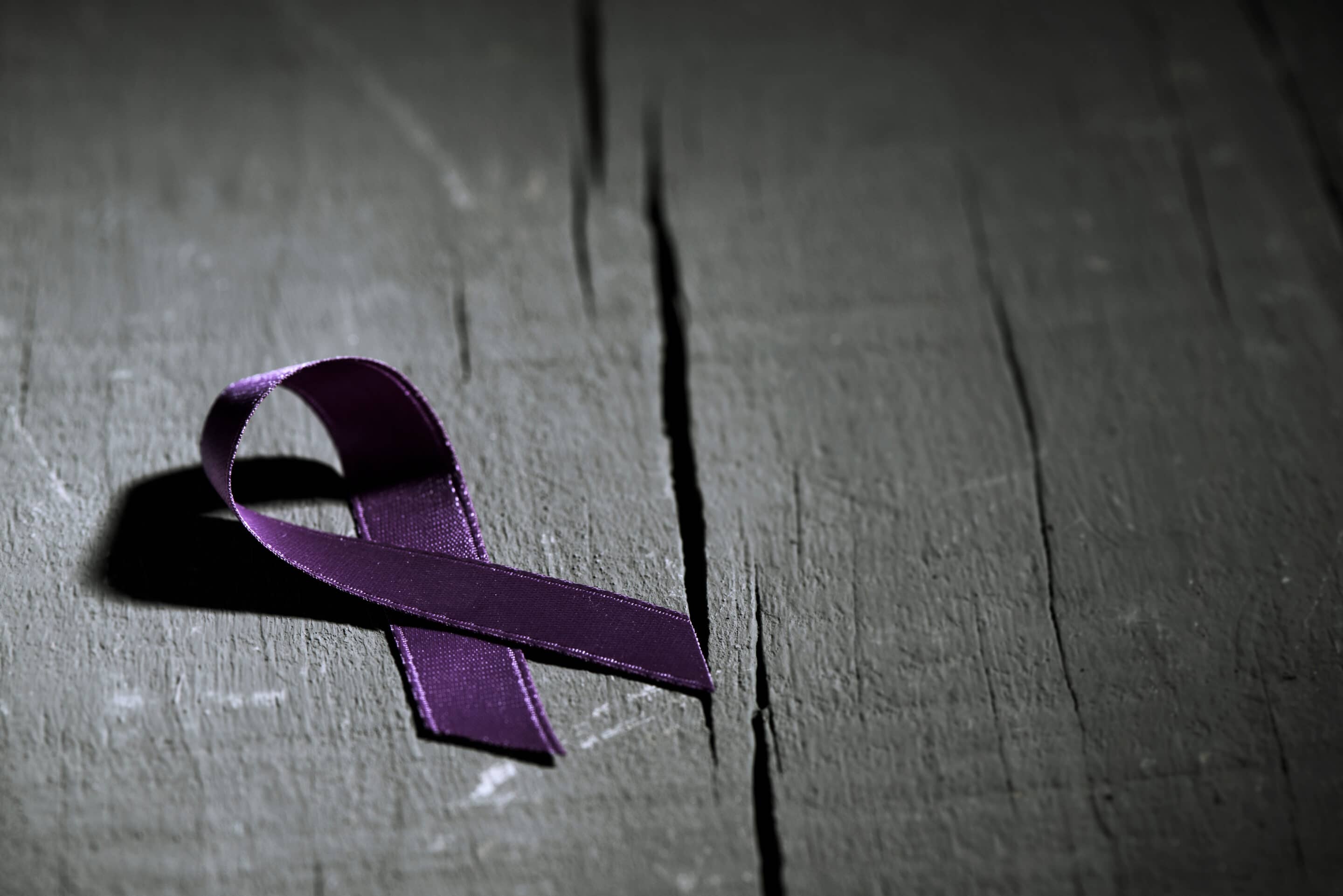 Purple Ribbon Against The Violence Against Women Catalyst Center