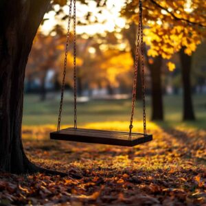 Empty swing in warm sunset light, symbolizing childhood loneliness and emotional longing.