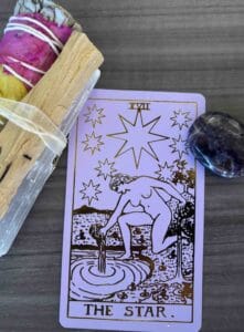 photo of tarot an sage to be used with pages and posts about personal growth, intution, and spiritual development