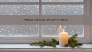 Candle glowing beside a window at winter dusk, reflecting stillness, grief, and sacred presence during the holidays