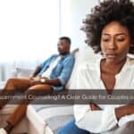 A couple sitting together in quiet reflection, symbolizing uncertainty and decision-making in their relationship.