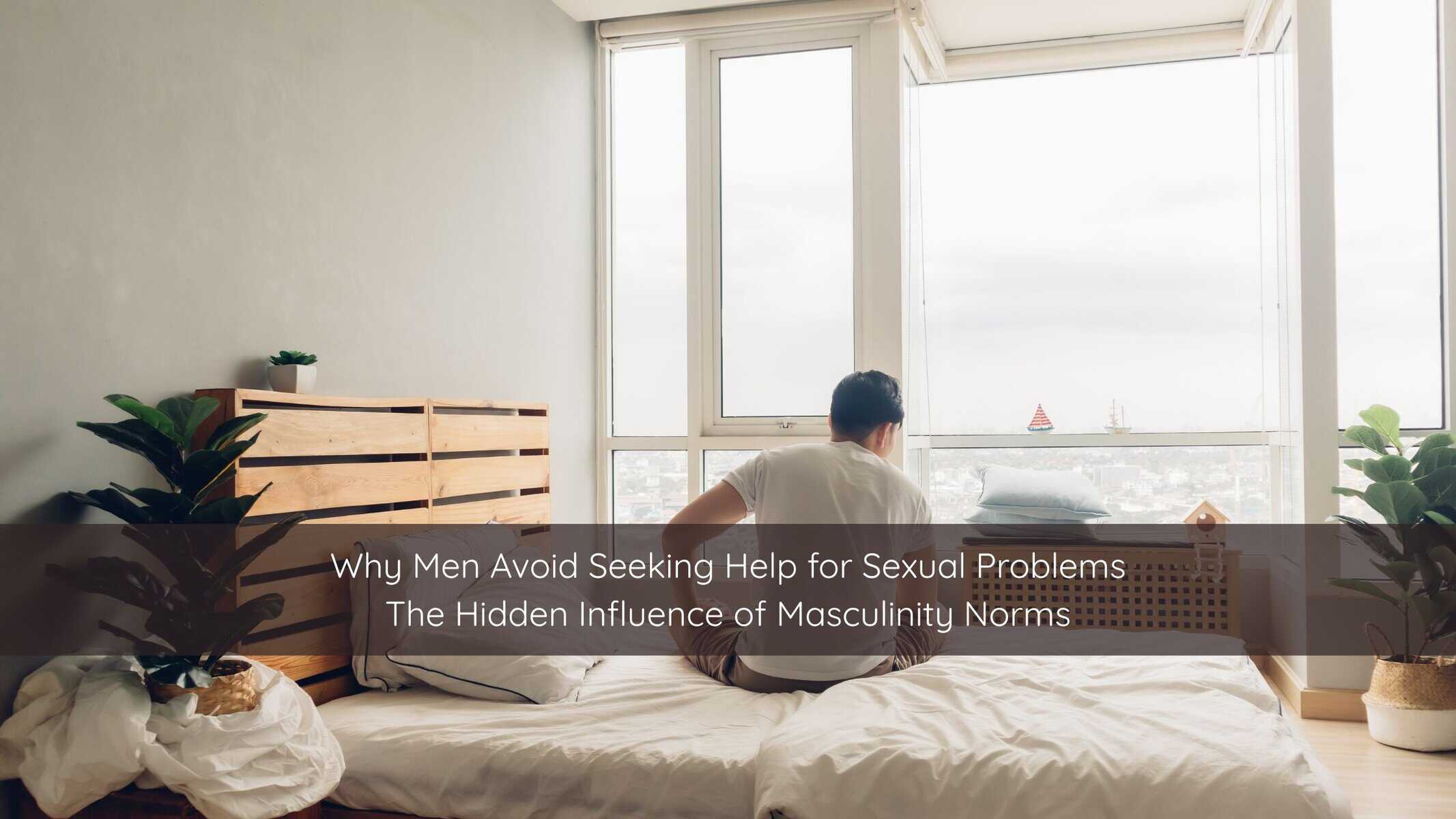 Man sitting on bed looking contemplative about seeking help for erectile dysfunction.