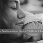 Mother holding a newborn baby, representing healing after birth trauma.
