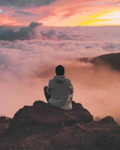 Person in meditation, showing the peace that can be found.