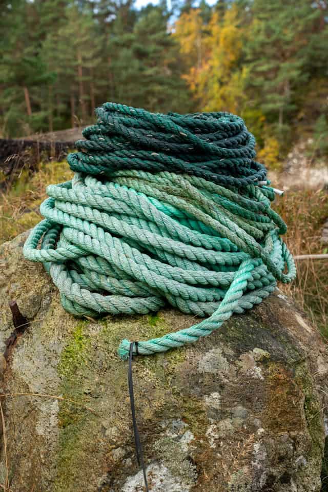 A tangled rope beginning to unravel, representing the pursue-withdraw cycle in relationships