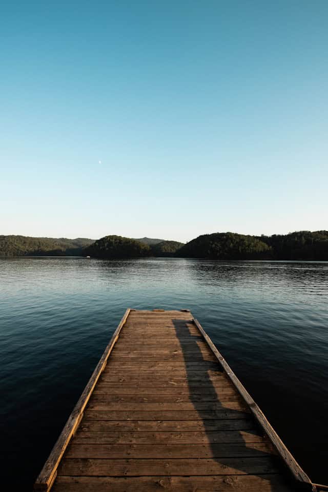 A bridge over calm water — steadiness and repair.