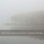 Mist drifting over calm water at dawn, evoking openness to the unknown